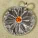 Small Fine Silver Flower Charm with Orange Cubic Zirconia